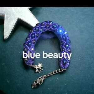 Purple Beaded Bracelet with Star Charm